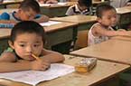 三千人小學校長成電工